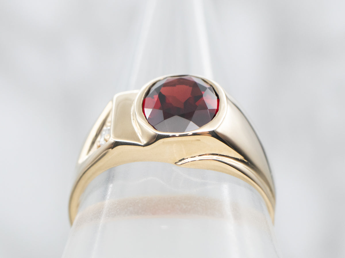 Yellow Gold Bezel Set Oval Cut Pyrope Garnet Ring with Diamond Accent