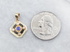 Yellow Gold Blue Glass Doublet, Black Enamel, and Seed Pearl Pendant