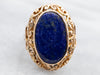 Yellow Gold Bezel Set Oval Cut Lapis Ring With Scrolling Frame