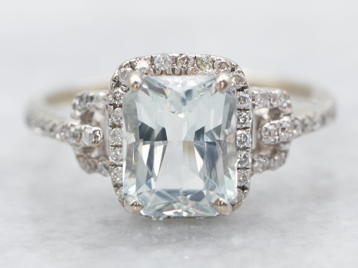White Gold Emerald Cut Aquamarine Ring with Diamond Halo and Diamond Shoulders