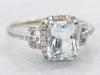 White Gold Emerald Cut Aquamarine Ring with Diamond Halo and Diamond Shoulders