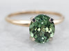 Yellow and White Gold Oval Cut Green Tourmaline Solitaire Ring