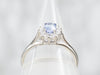 White Gold Oval Cut Sapphire Engagement Ring with Diamond Halo