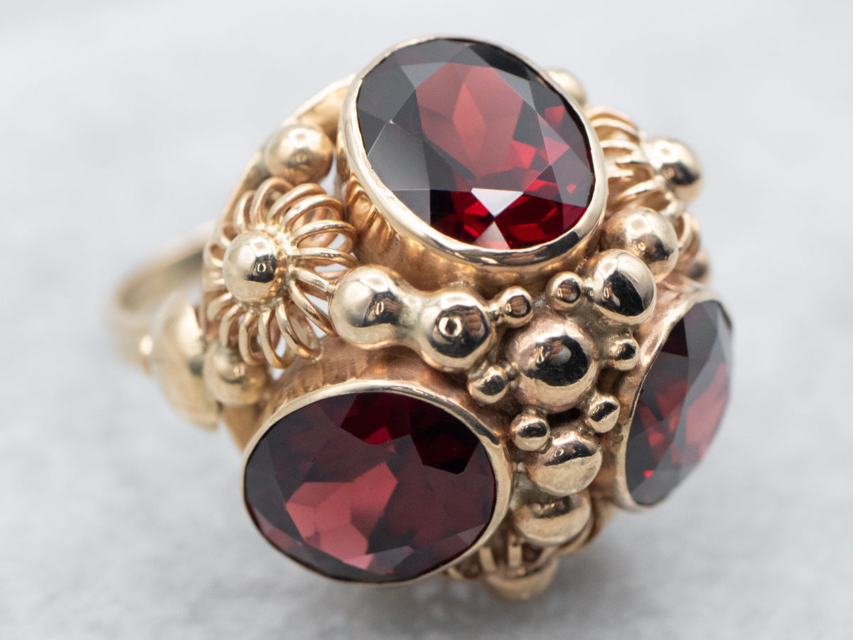 Yellow Gold Bezel Set Oval Cut Pyrope Garnet Dome Ring