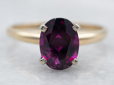 Two Tone Oval Cut Rhodolite Garnet Solitaire Ring