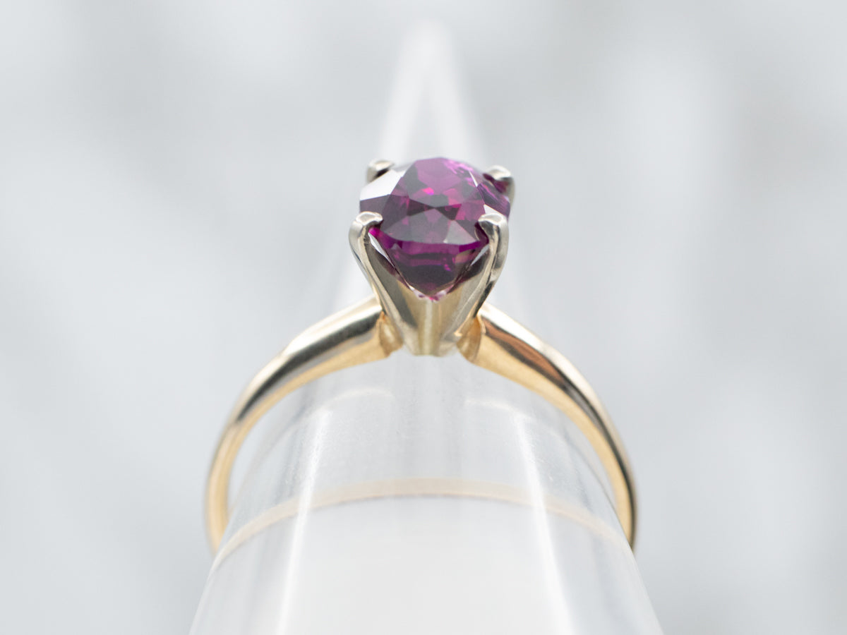 Two Tone Oval Cut Rhodolite Garnet Solitaire Ring