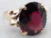 Yellow Gold Oval Cut Pyrope Garnet Solitaire Cocktail Ring