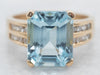 Yellow Gold Emerald Cut Blue Topaz Ring with Diamond Shoulders