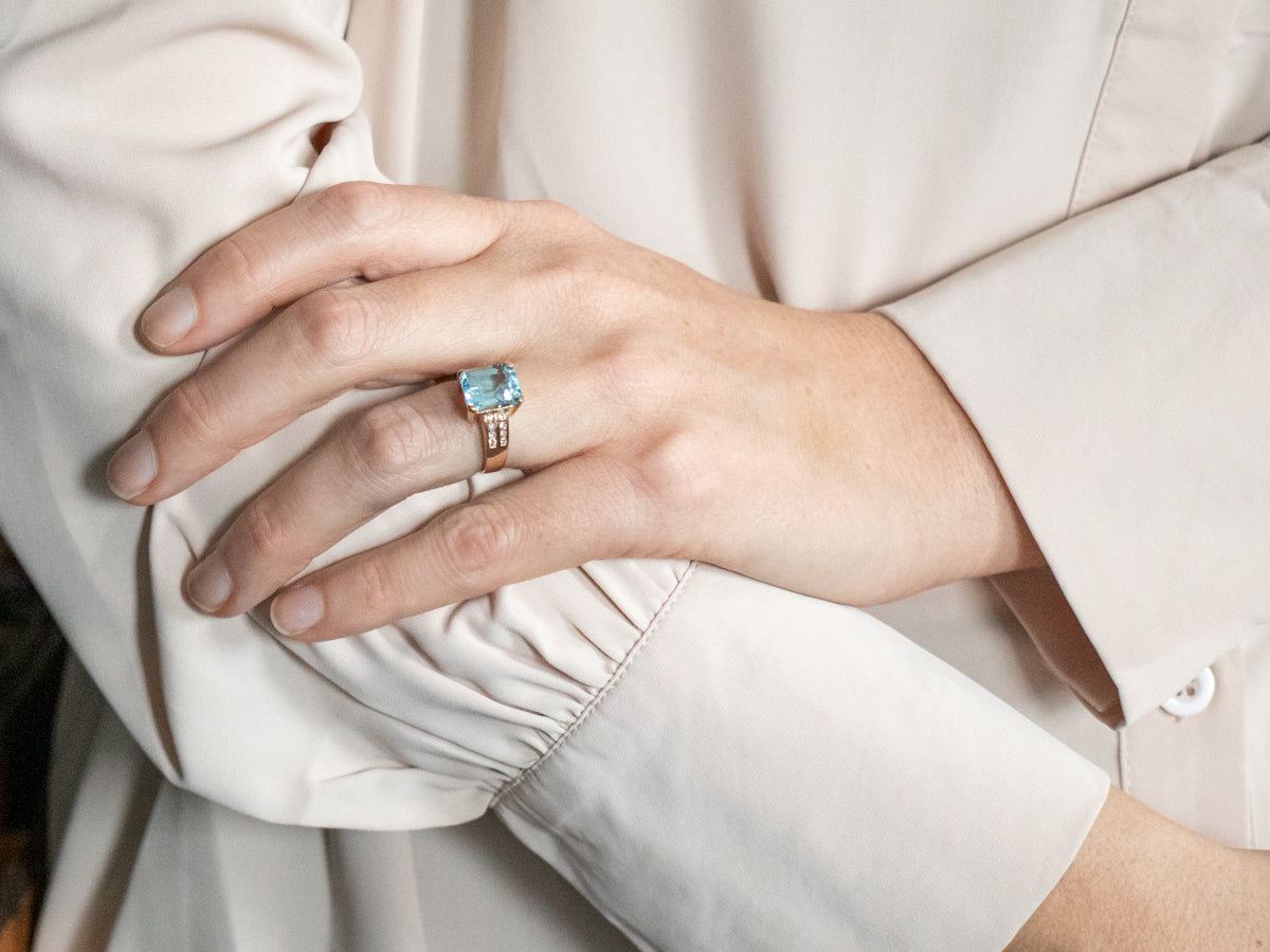 Yellow Gold Emerald Cut Blue Topaz Ring with Diamond Shoulders