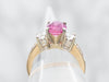 Two Tone Oval Cut Pink Sapphire and Diamond Ring with Channel Set Diamond Shoulders