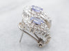 White Gold Oval Cut Tanzanite Stud Earrings with Round and Baguette Cut Diamond Accents and Omega Backs