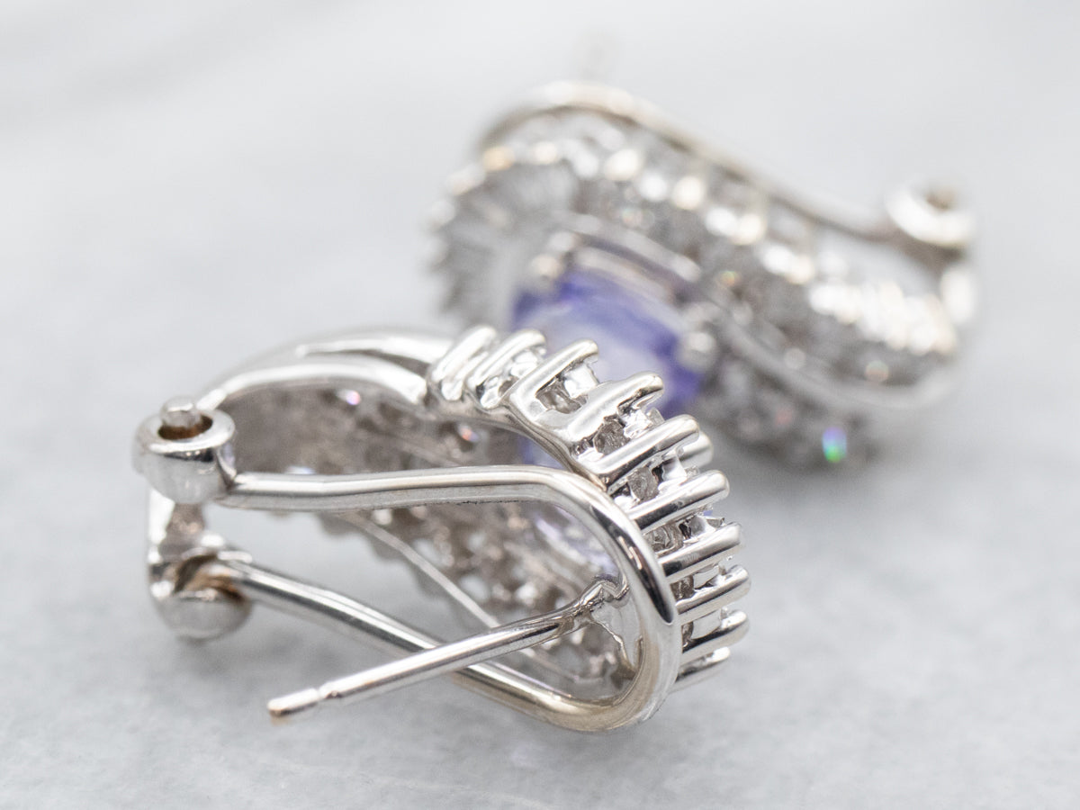 White Gold Oval Cut Tanzanite Stud Earrings with Round and Baguette Cut Diamond Accents and Omega Backs