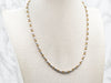 Two Tone Faceted Oval Bead and Small Round Cluster Bead Necklace