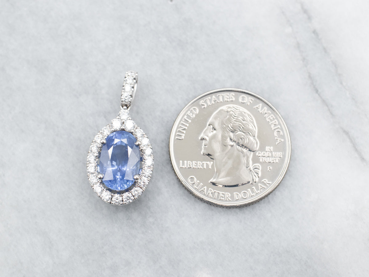 Stunning Sapphire and Diamond Halo Pendant