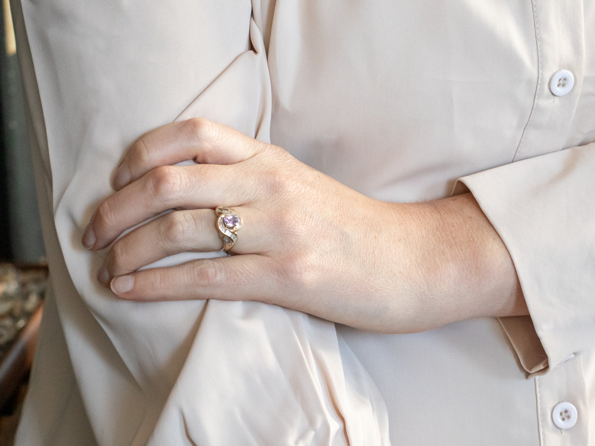 Yellow Gold Oval Cut Purple Sapphire Swirl Ring with Baguette Cut Diamond Halo