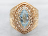Yellow Gold Marquise Cut Blue Topaz Solitaire Ring With Filigree Heart Shoulders