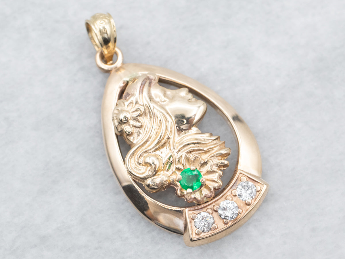 Colgante de perfil de dama en oro amarillo con detalles en esmeralda y diamantes