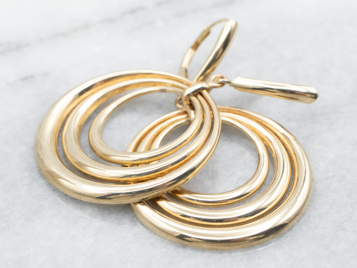 Pendientes colgantes de oro amarillo con triple círculo