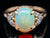 Yellow Gold Oval Cut Opal Ring with Diamond Accents