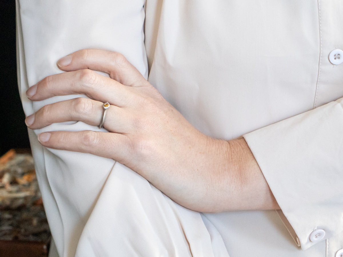 Matte White Gold Bezel Set Oval Cut Yellow Sapphire Solitaire Ring