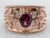 Rose Gold Bezel Set Oval Cut Rhodolite Garnet Ring with Diamond Accents