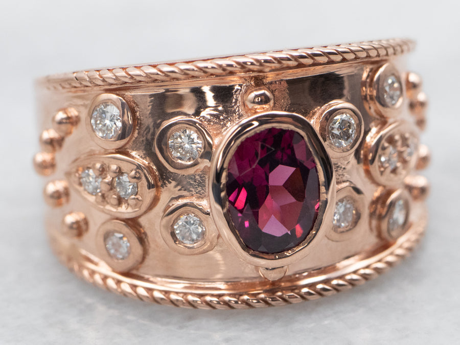 Rose Gold Bezel Set Oval Cut Rhodolite Garnet Ring with Diamond Accents