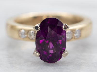 Yellow and White Gold Oval Cut Rhodolite Garnet Ring with Diamond Accents