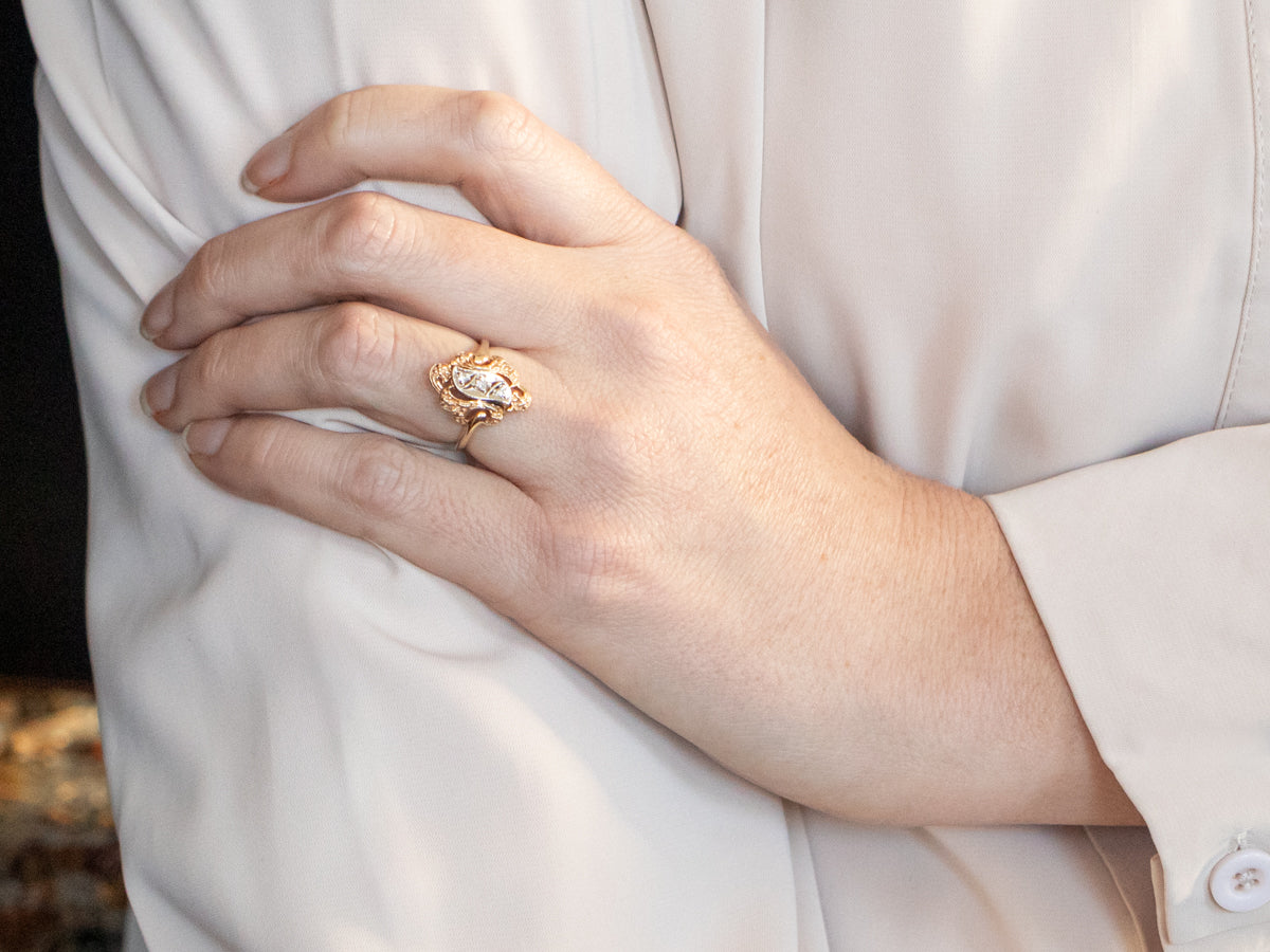 Yellow and White Gold Diamond Ring with Ornate Frame