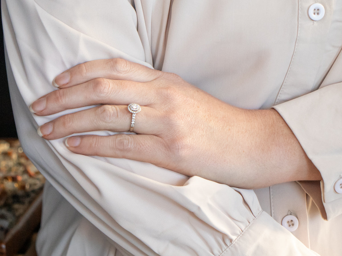 Modern Oval Cut Diamond Engagement Ring with Double Diamond Halo