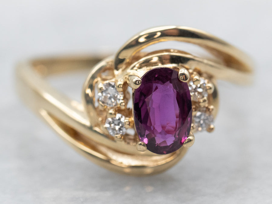 Yellow Gold Oval Cut Ruby Bypass Ring with Diamond Accents