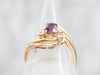 Yellow Gold Oval Cut Ruby Bypass Ring with Diamond Accents