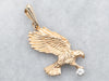Yellow Gold Eagle Pendant with Bezel Set Diamond Accent