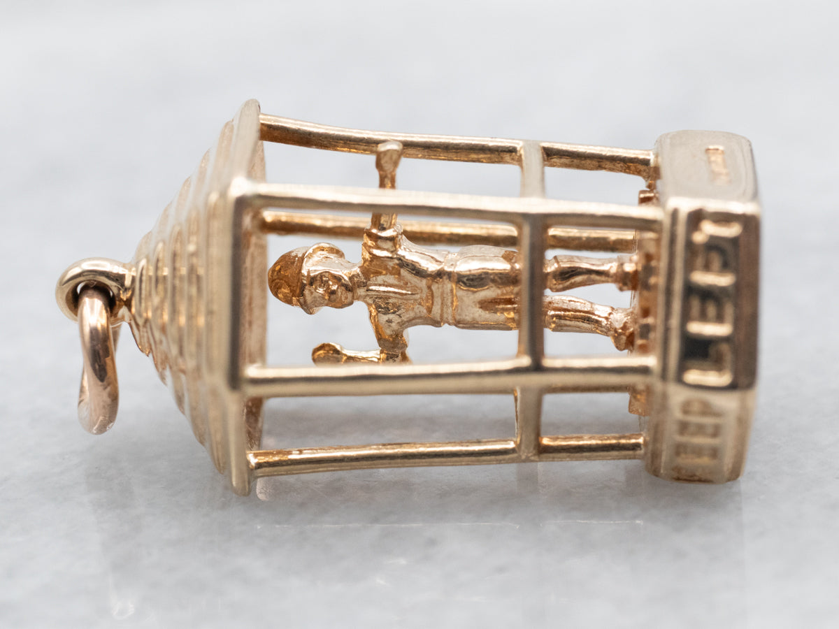 Encanto de director de tráfico vintage dorado "MANTÉNGASE A LA IZQUIERDA"