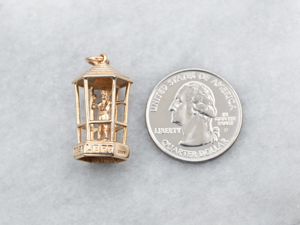 Encanto de director de tráfico vintage dorado "MANTÉNGASE A LA IZQUIERDA"