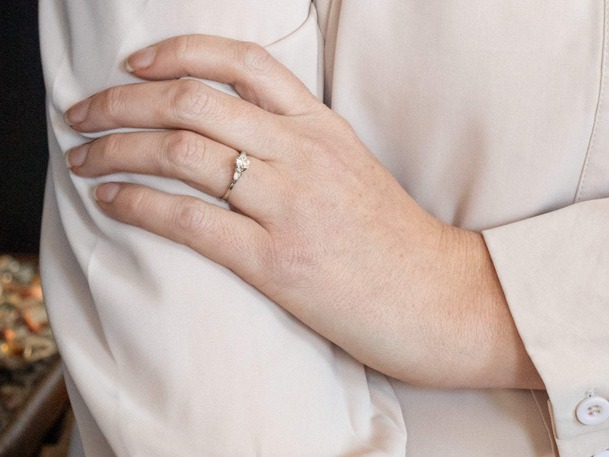 White Gold Diamond Engagement Ring with Baguette Cut Diamond Accents