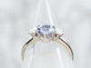 White Gold Round Cut Sapphire Engagement Ring with Diamond Accents