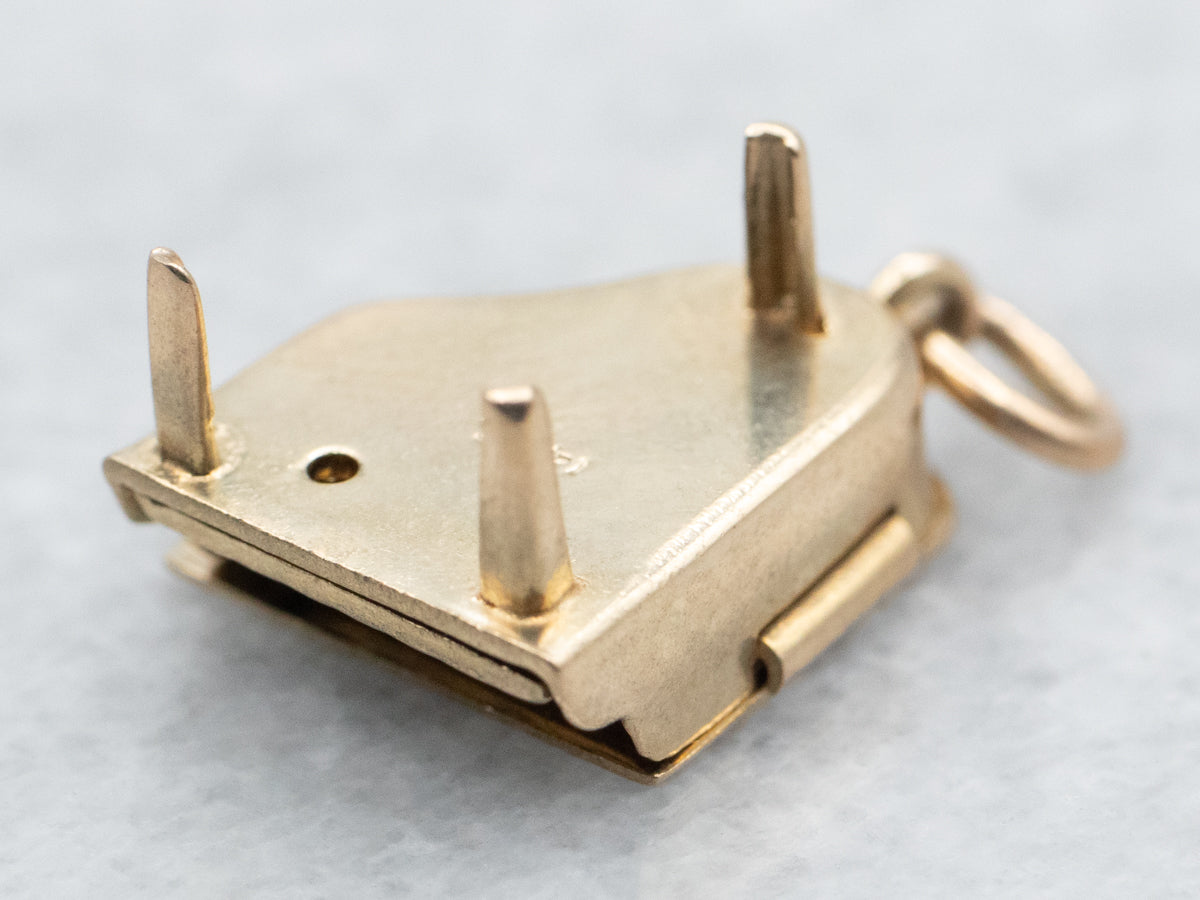 Charm de piano con apertura de esmalte blanco y negro en oro amarillo