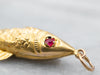 Yellow Gold Moving Fish Pendant with Synthetic Ruby Eyes