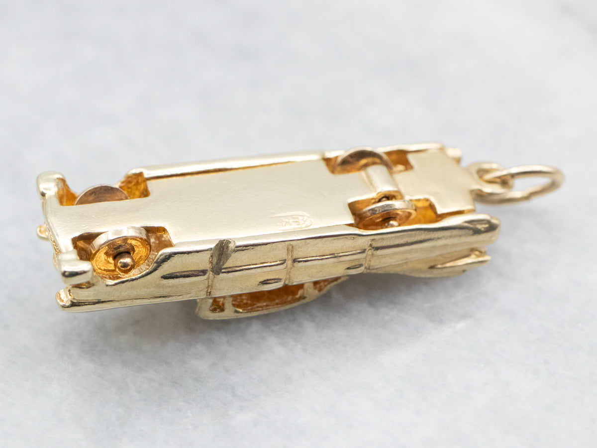 Yellow Gold Car Charm with Spinning Wheels