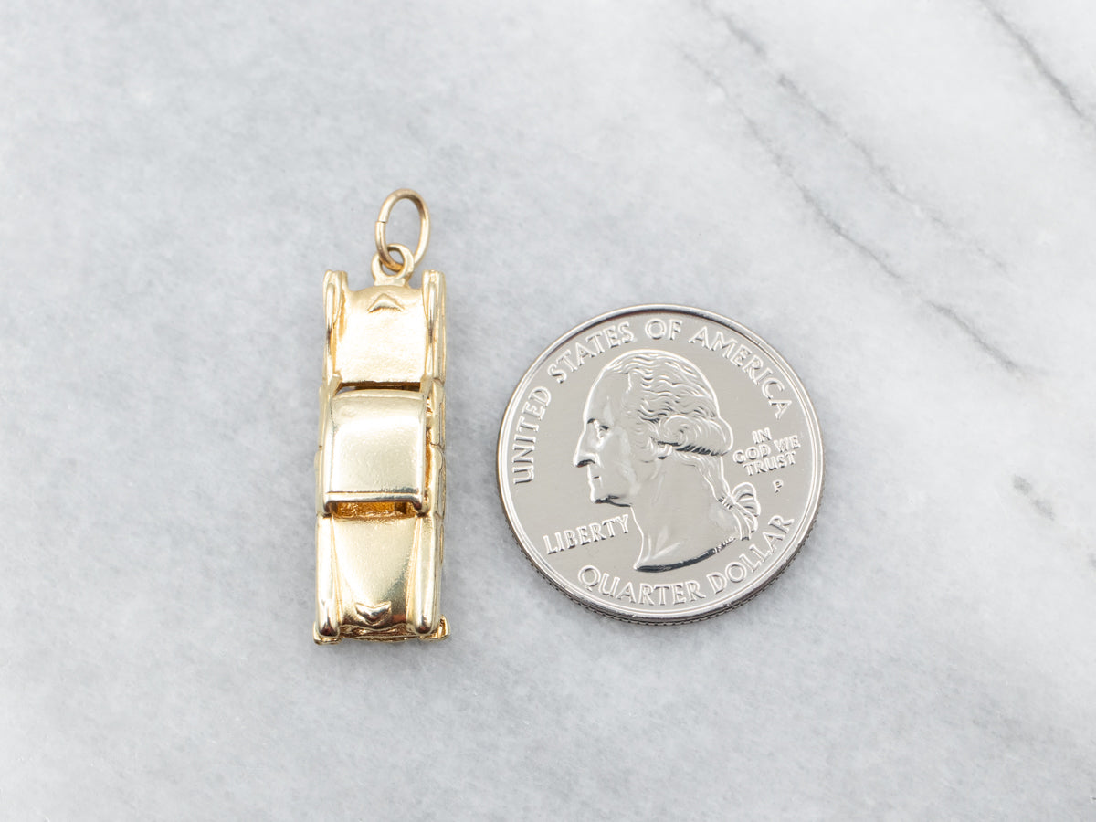 Yellow Gold Car Charm with Spinning Wheels