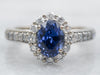 Modern Oval Cut Sapphire Halo Engagement Ring