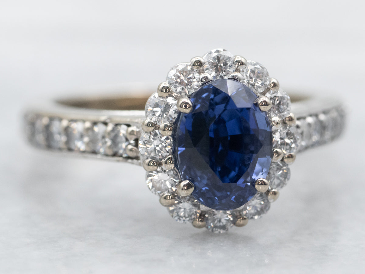 Modern Oval Cut Sapphire Halo Engagement Ring