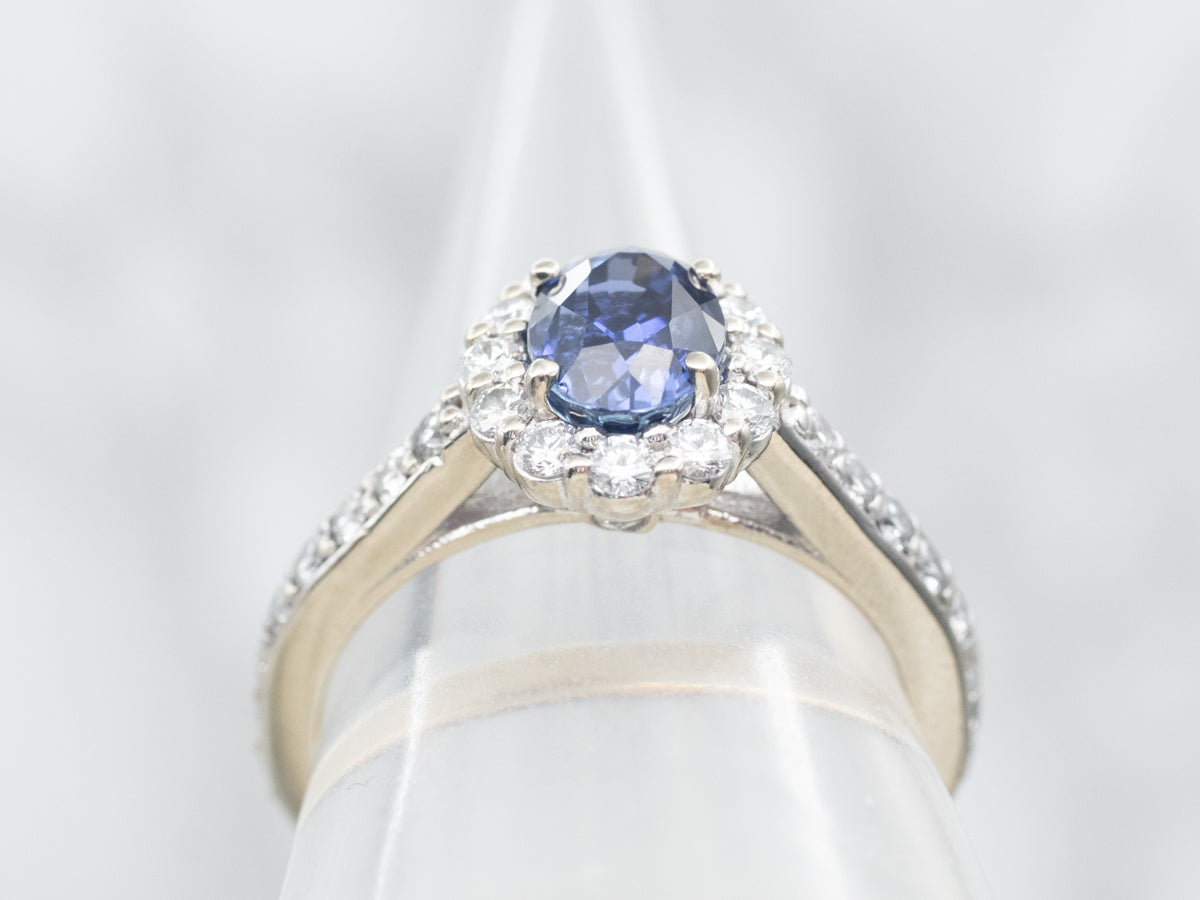 Modern Oval Cut Sapphire Halo Engagement Ring