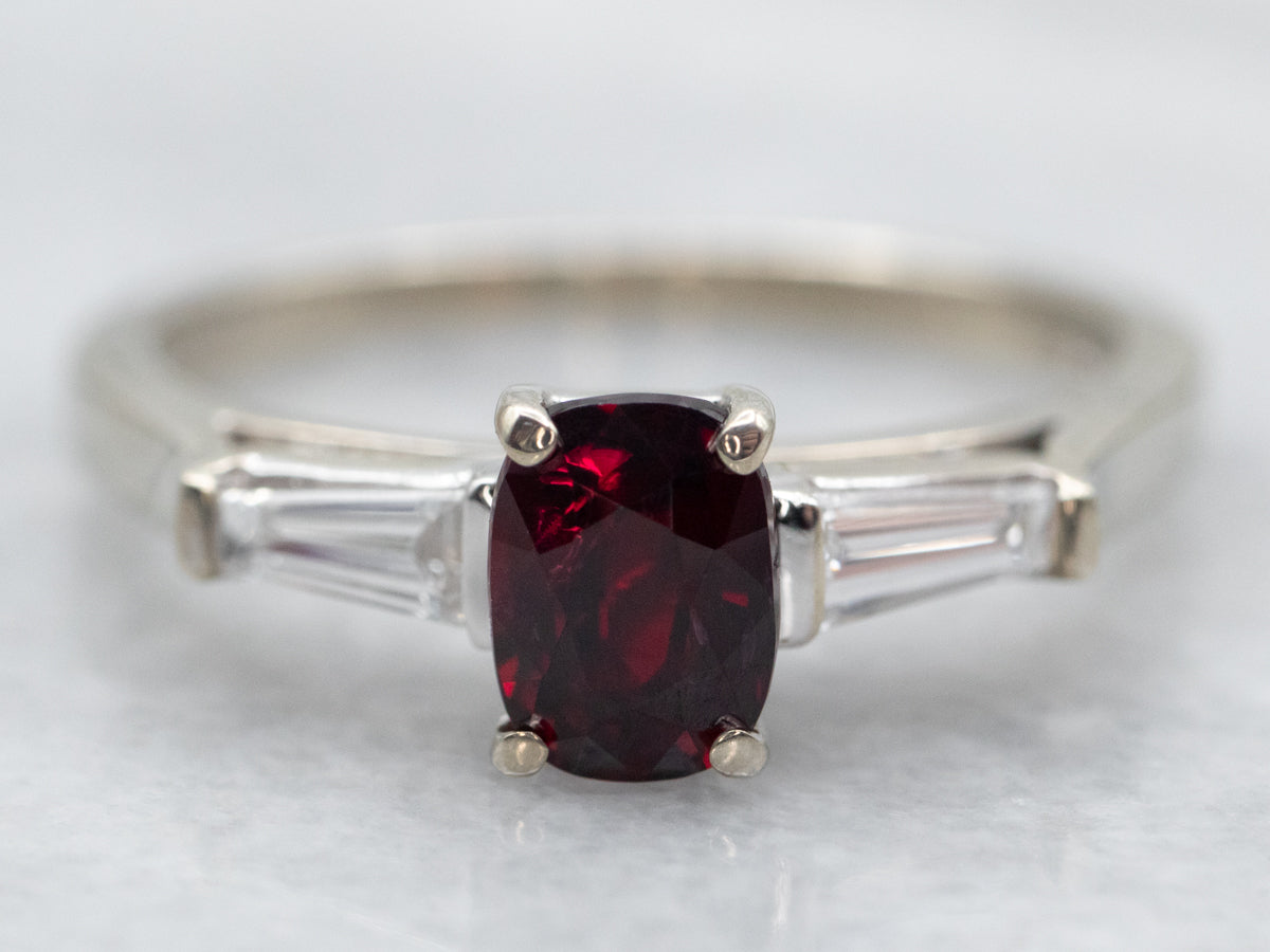 White Gold Oval Cut Ruby Ring with Baguette Cut Diamond Accents