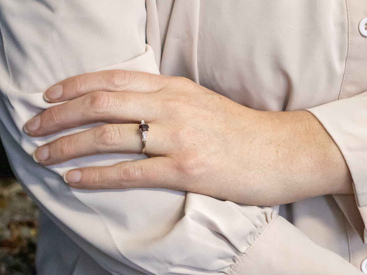 White Gold Oval Cut Ruby Ring with Baguette Cut Diamond Accents