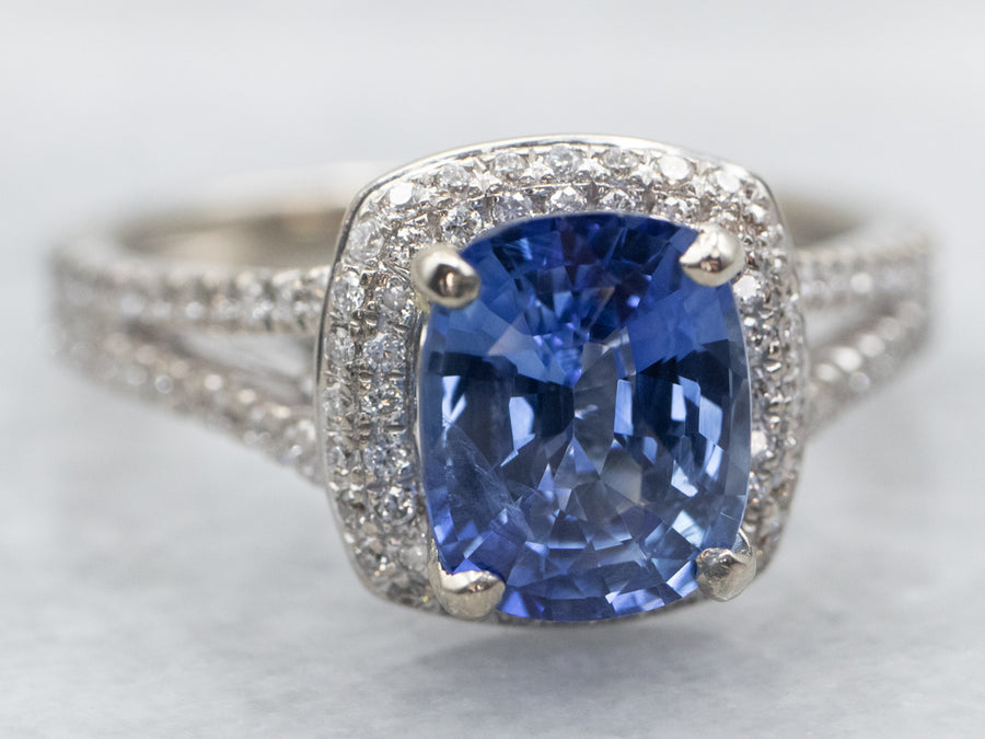 Modern Cushion Cut Sapphire Engagement Ring with Diamond Halo