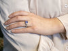 Modern Cushion Cut Sapphire Engagement Ring with Diamond Halo