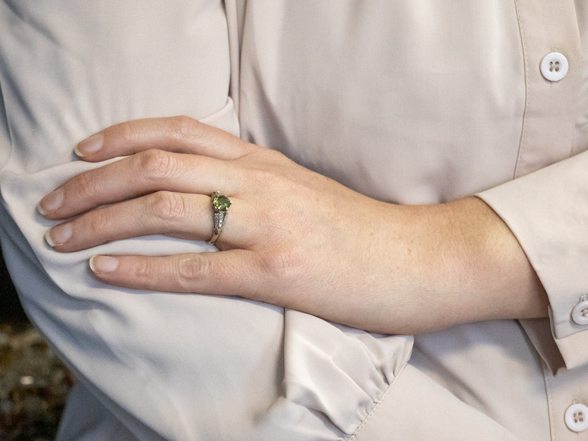 Two Tone White and Yellow Gold Round Cut Sphene Ring with Triple Row Diamond Shoulders
