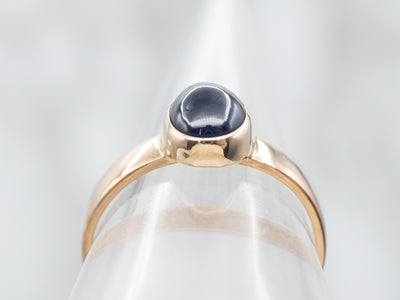 Bezel-Set Sapphire Cabochon Solitaire Ring