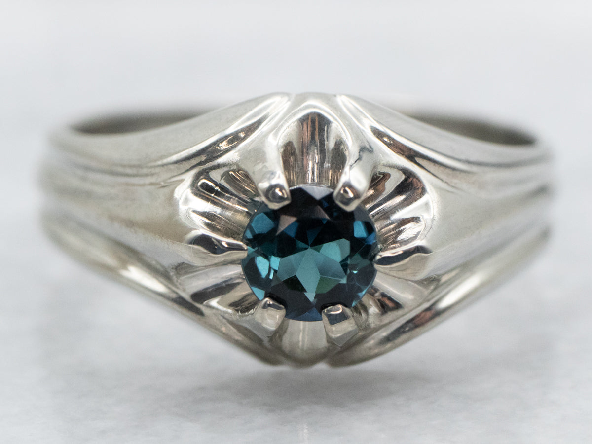 Anillo con solitario de turmalina e indicolita de talla redonda con engaste Belcher de oro blanco